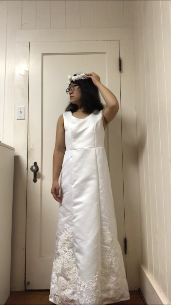 Designer, Naomi Uchida dons their Recycled Wedding Gown